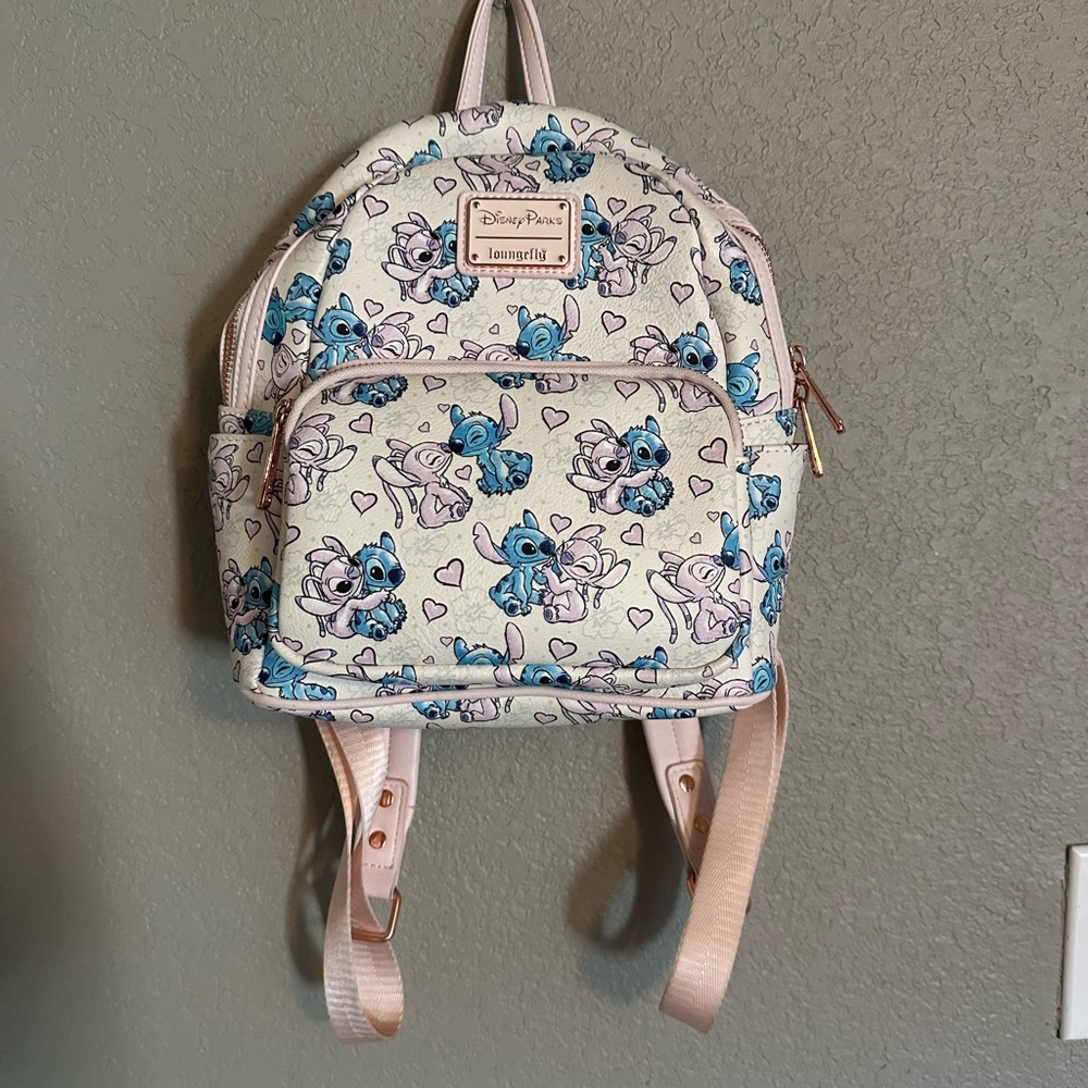 Disneyparks loungerfly Backpack Stitch & Lola Disney,